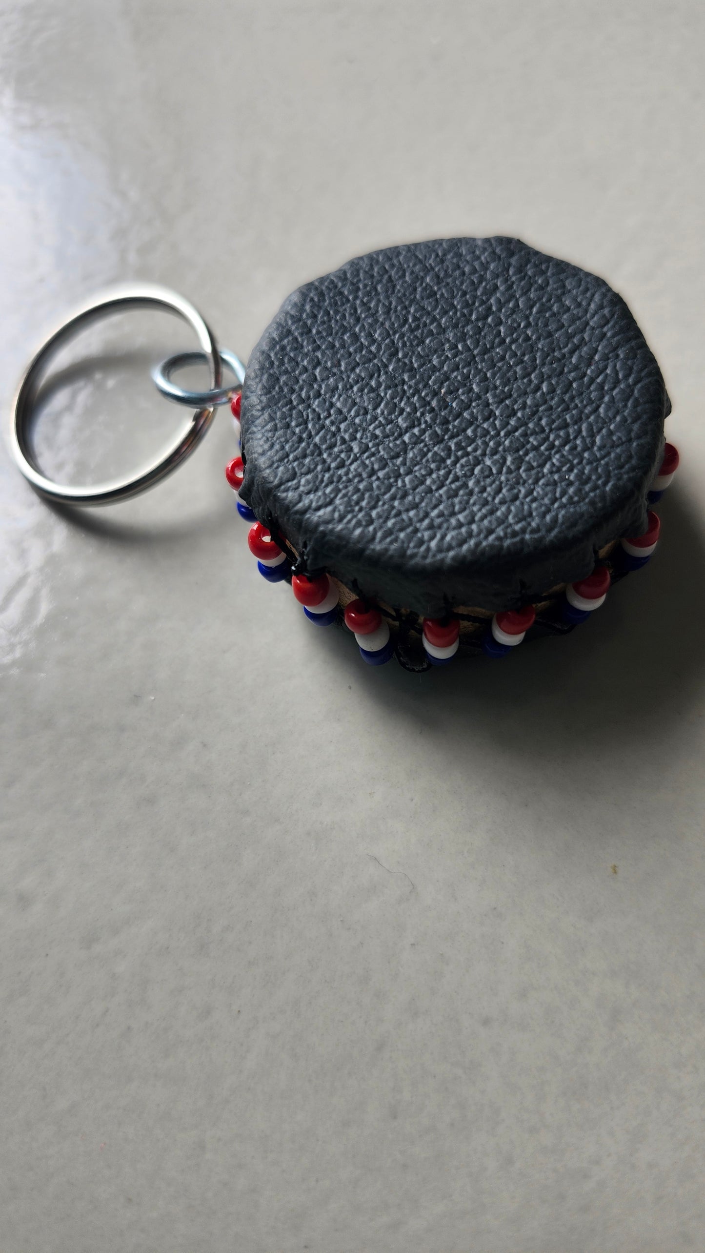 Multicolored flat drums keychains